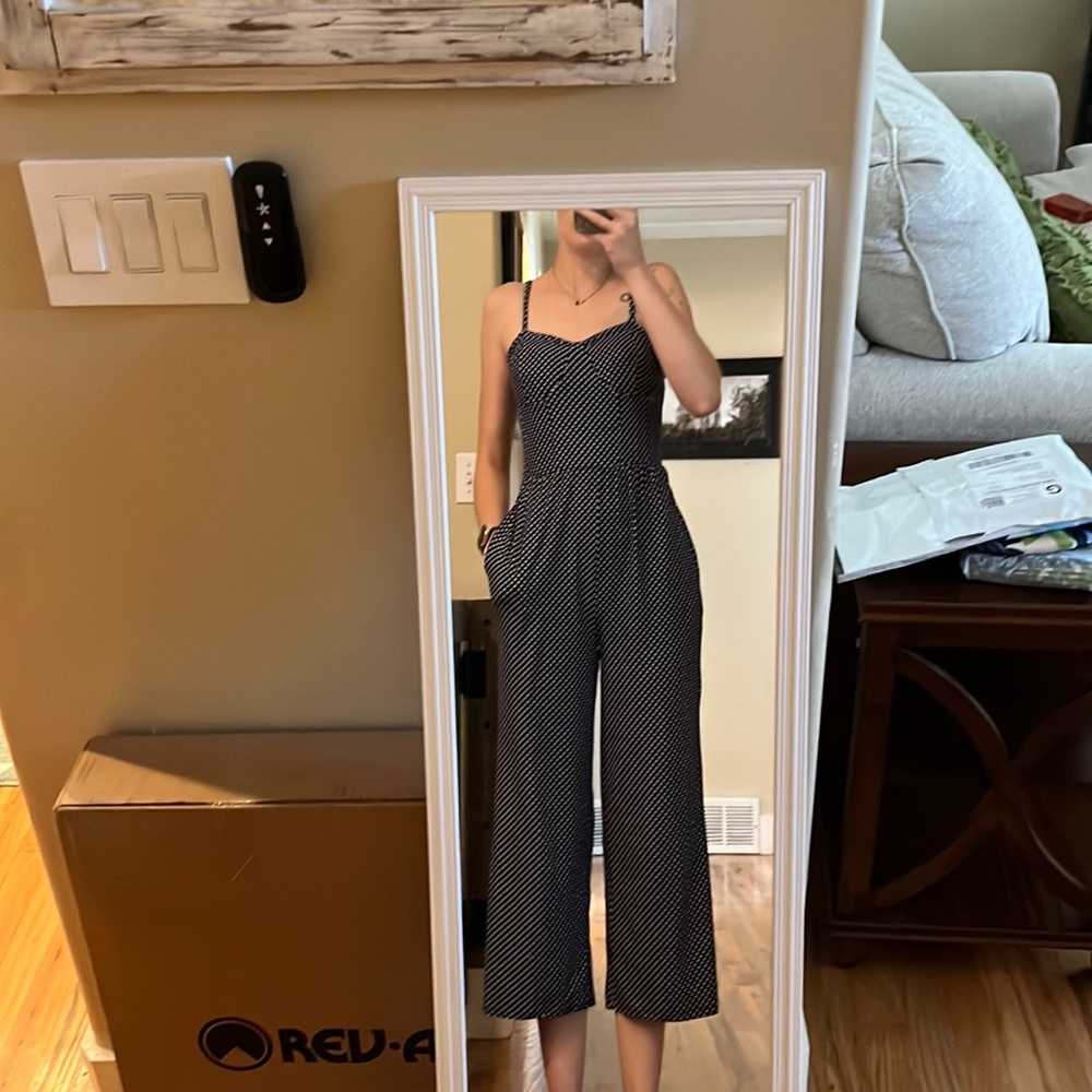 Navy blue jumper with white pokadots